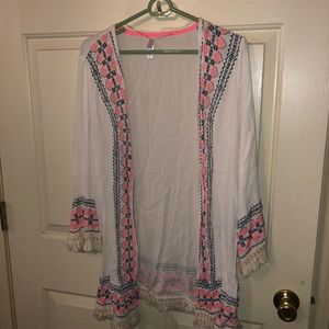 White kimono with teal and pink detail